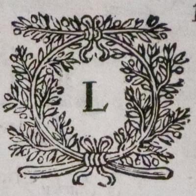 Letter W on verso of John Speed map